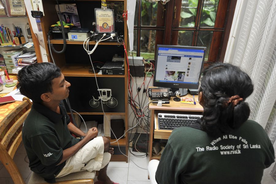 Sri Lanka 4S6YRW 4S6ARW Sri Lanka 4S6YRW 4S6ARW Sri Lanka 4S6YRW 4S6ARW Left: Reshan, 4S6YRW, is at hand helping his mother Rajini, 4S6ARW, at the computer.