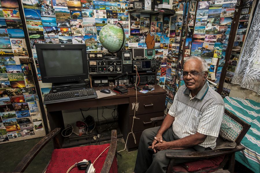 Sri Lanka 4S7NE QSLs All walls of Nelson’s radio shack are decorated with colourful QSL cards 