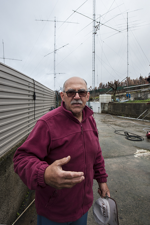Antonio, CT1DVV, in December 2017 with the antennas behind him.