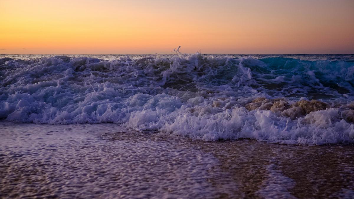 VQ5Z Golden Waves, Sunset, Grace Bay, Providenciales Island, Turks and Caicos Islands. Tourist attractions spot.